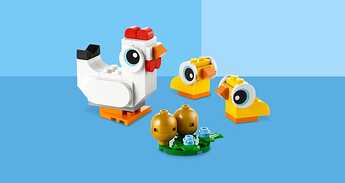 Ensemble LEGO comprenant deux poussins jaunes et une poule blanche en
